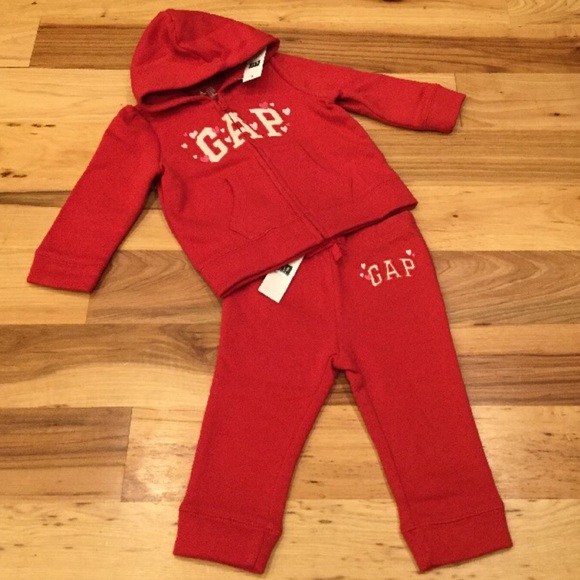 red sweatshirt and sweatpants